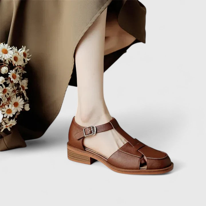 Isara | Low block heel sandals with side cut-out detail